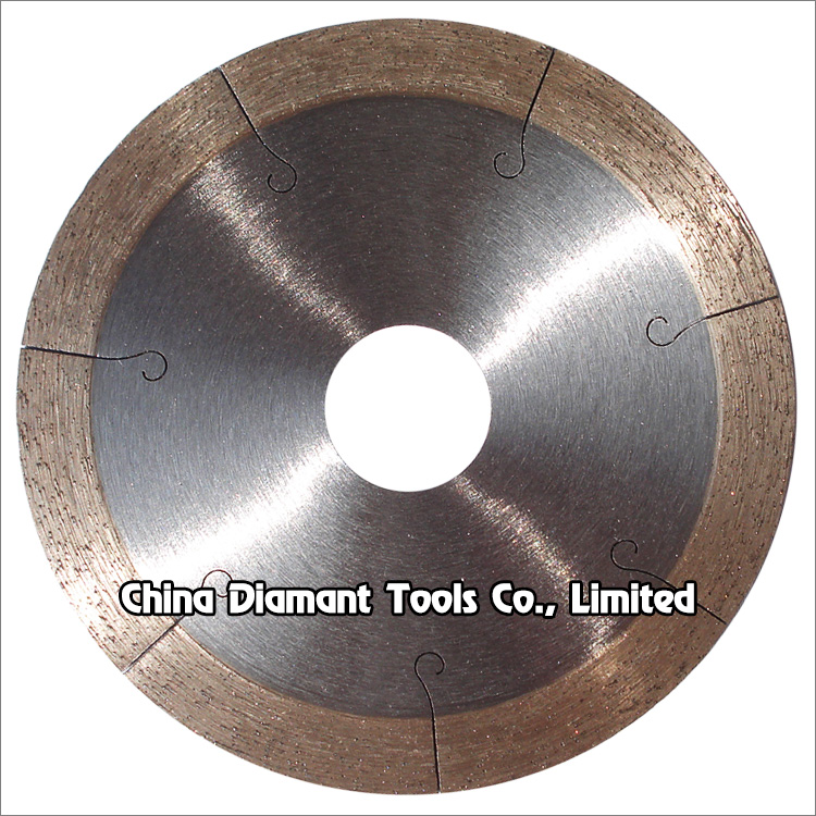Diamond dry cutting saw blades - continuous rim segments with J slots