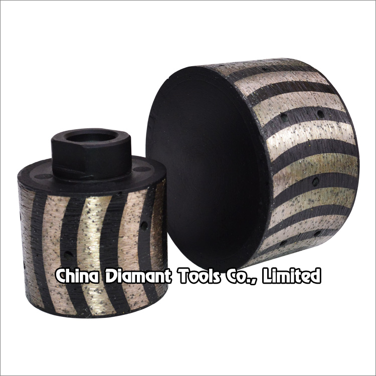 Diamond drum wheels for granite - resin filled metal bond curved segments