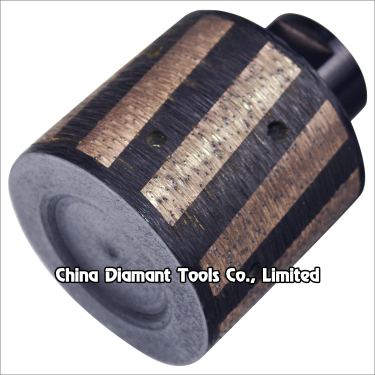 Diamond drum wheels for granite - resin filled metal bond twisted segments